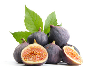 Ripe sweet figs with leaves isolated on white