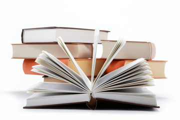 A stack of books on a white background.