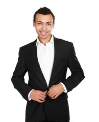 A portrait of a businessman standing isolated