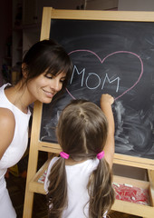 mother and son at blackboard