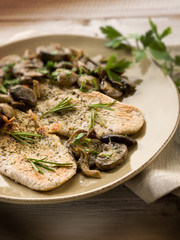 chicken fillet with sauteed mushroom, selective focus