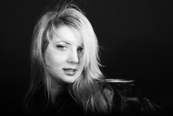 Beautiful girl blonde in black shirt