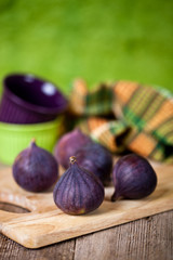 fresh figs on rustic wooden table