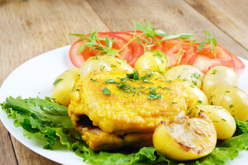 Fried fish with boiled new potatoes