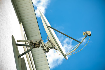Satellite antenna on a house facade