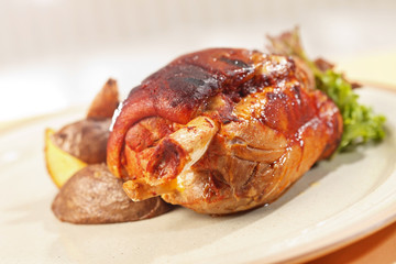 roasted pork knuckle with potatoes