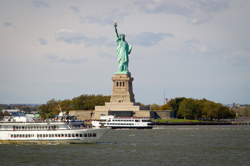 Tourists flocking to the Statue of Liberty, NY © art2002