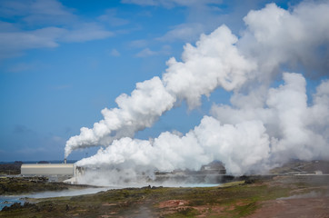 Smoking factory field polluting the air
