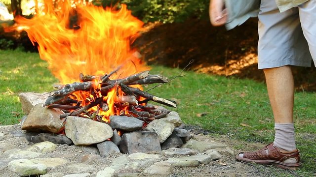 Man making a bonfire