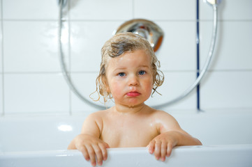 little child in the bath tub