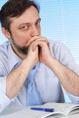 Dreaming entrepreneur in his office