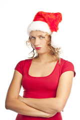 Unhappy young woman on white background. Christmas