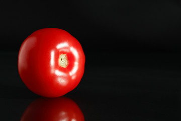 Red Tomato On Black