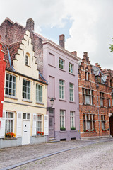 European small street with old brick houses. Bruges. Belgium.