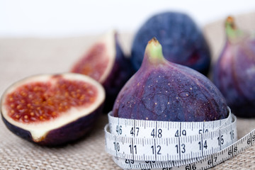 Measure tape and healthy figs