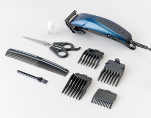 Electric hair trimming set on white