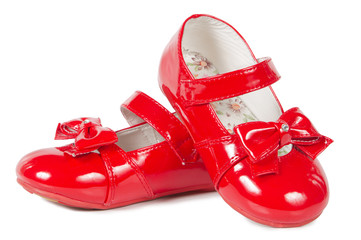 Female red shoes on white background