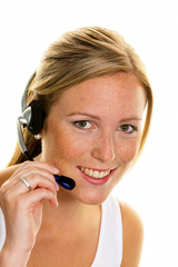 Fototapeta premium Frau mit Headset im Kundenservice