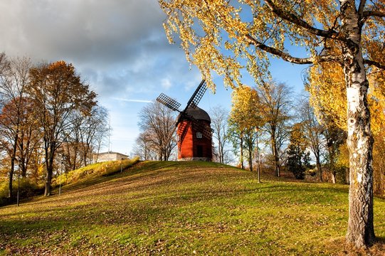Old windmill during autumn in Sweden