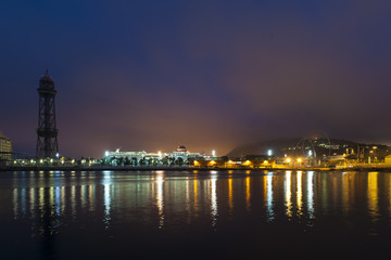 Fototapeta na wymiar Cityscape at night with reflected lights