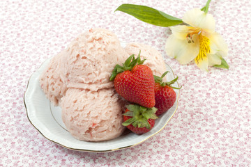 strawberry ice cream with flowers at the side