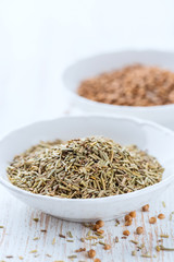 Dried rosemary and coriander seeds