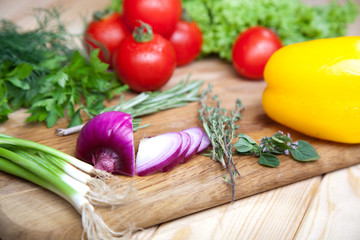 Fresh vegetables on cutting board.