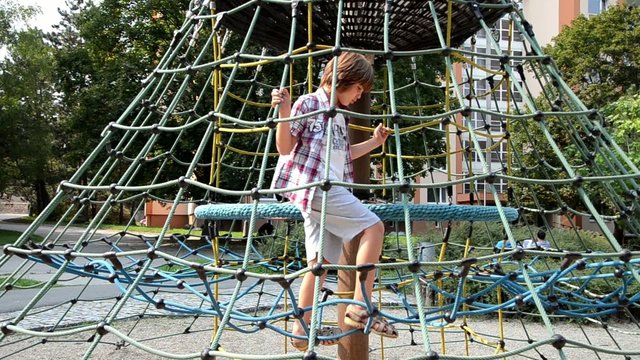 Young boy playing at a park