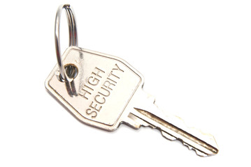 steel door key on white