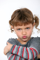 Angry little girl grinning