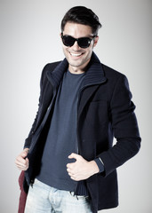 Fototapeta premium attractive man smiling and posing in the studio