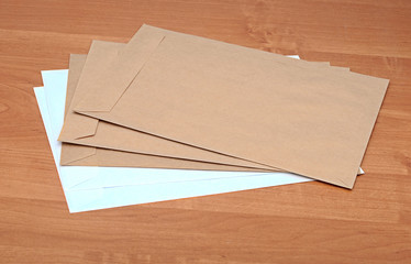 brown envelopes on table