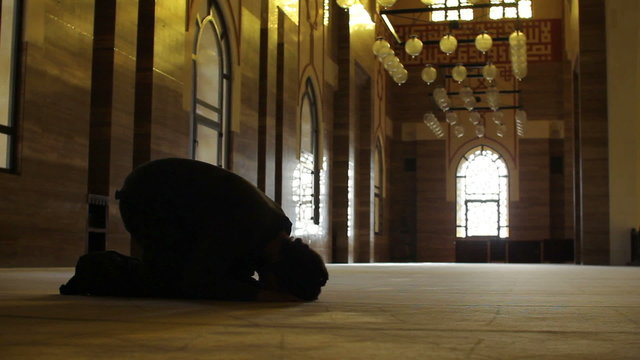 namaz: muslim man worship in mosque