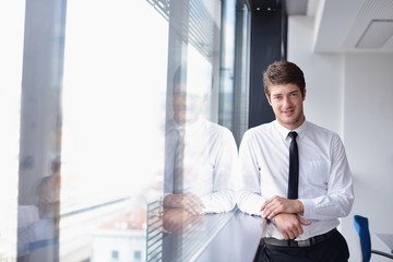 Fototapeta premium business man on a meeting in offce with colleagues in backgroun
