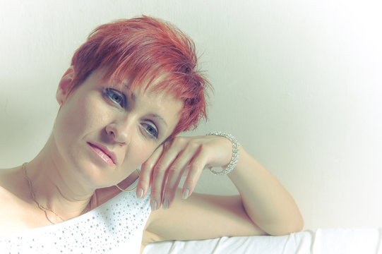 Portrait of a beautiful red hair woman - Powered by Adobe