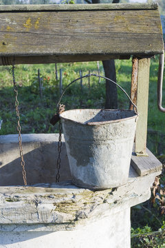Old well with bucket