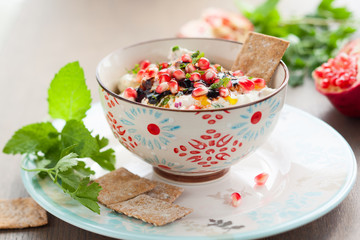 Cheese dip with pomegranate seeds