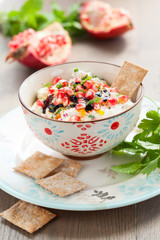 Cheese dip with pomegranate seeds