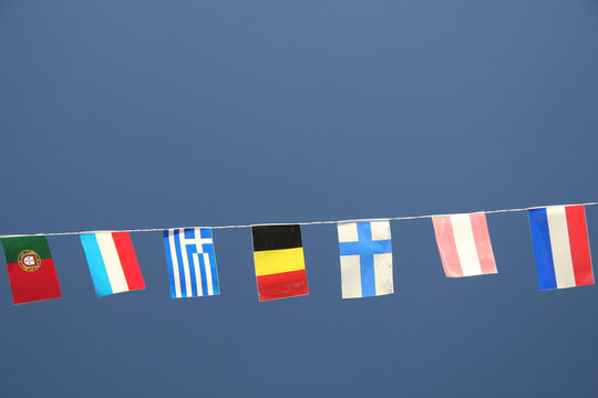 European flags in a clear blue sky