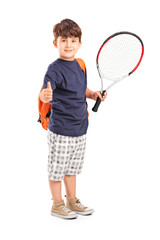 Child holding a tennis racket and giving thumb up