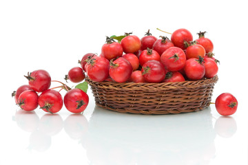 ripe apples small size on a white background in the basket