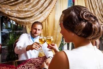 happy couple with wine glass