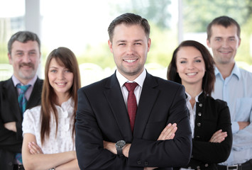 professional business team looking confidently at camera