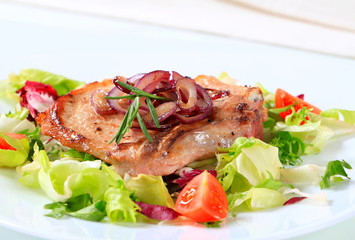 Pork cutlet with green salad