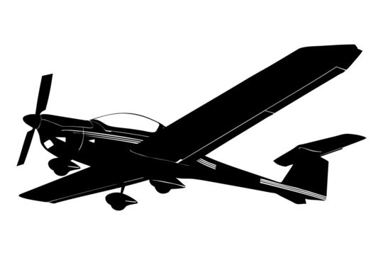 A silhouette of a small plane preparing to land