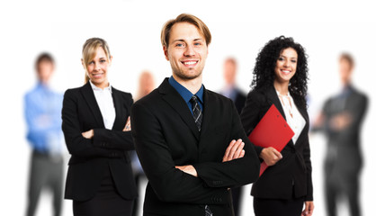 Businessman in front of his team