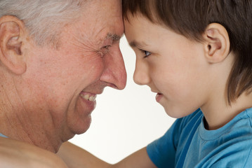 Happy Caucasian grandfather and grandson