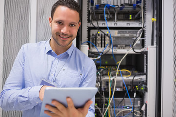 Happy worker with tablet pc