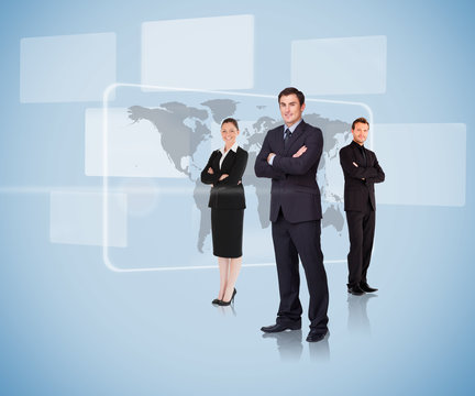 Business people standing in front of a map