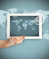 Tablet PC showing a business world map